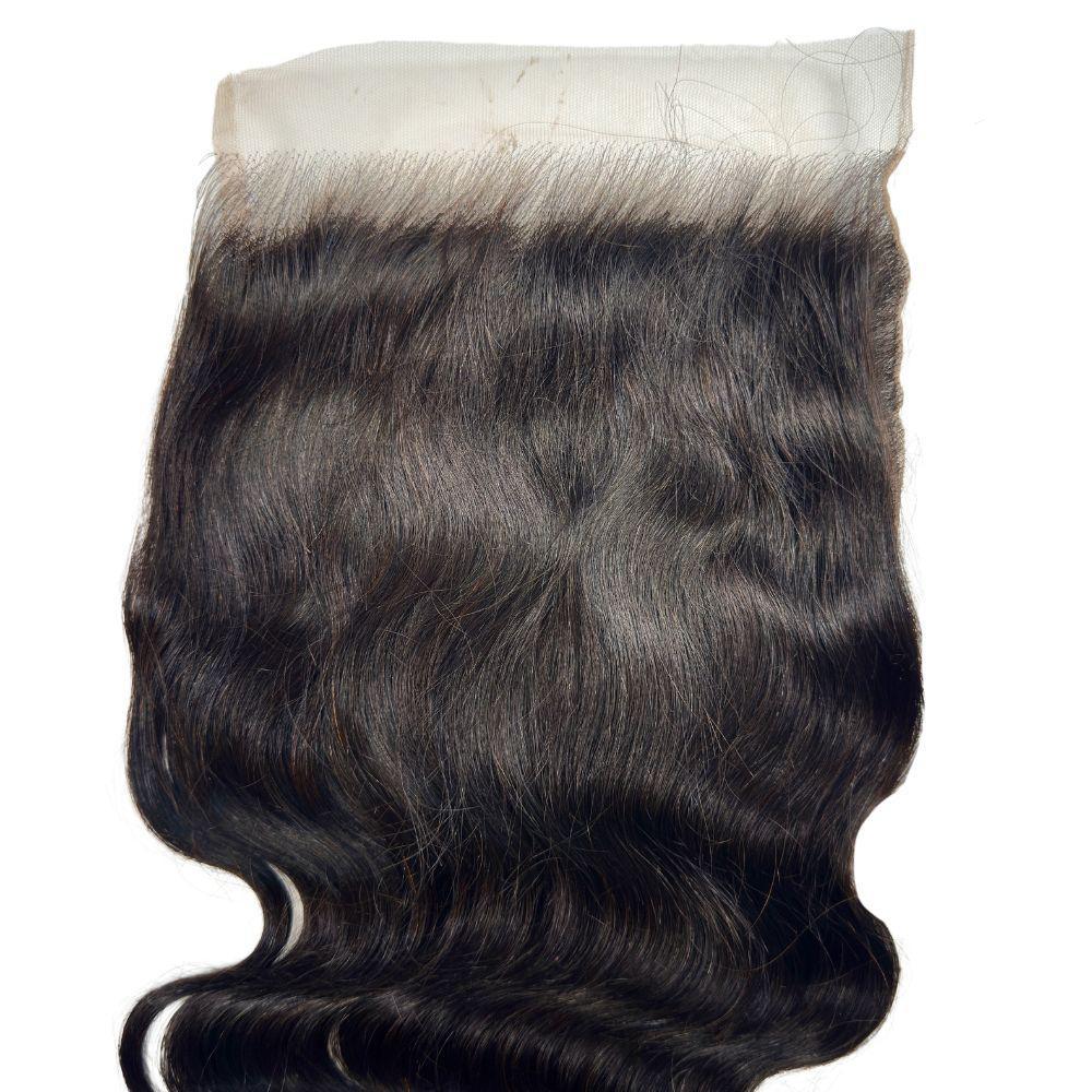 Close-up of the Body Wave 7x7 HD Lace Closure from LUSSOBYSB showcasing its soft and wavy texture, made from 100% human hair.